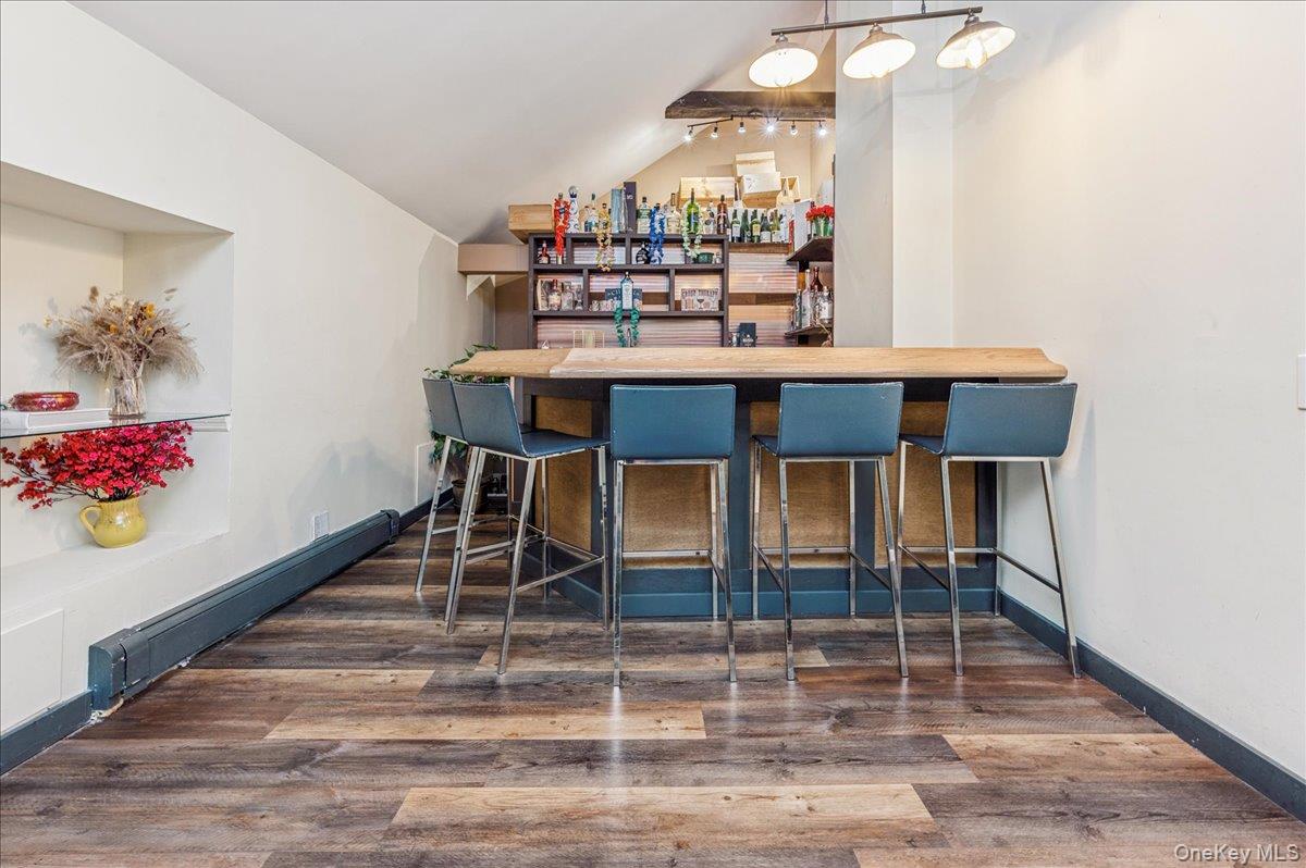 584 Milltown Road Brewster, NY 10509 - Photo 11 of 37 a dining room with furniture and wooden floor