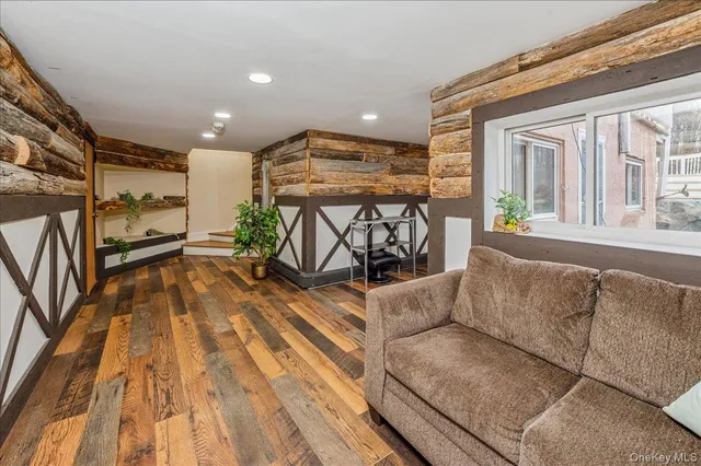 a view of a livingroom with furniture and a rug