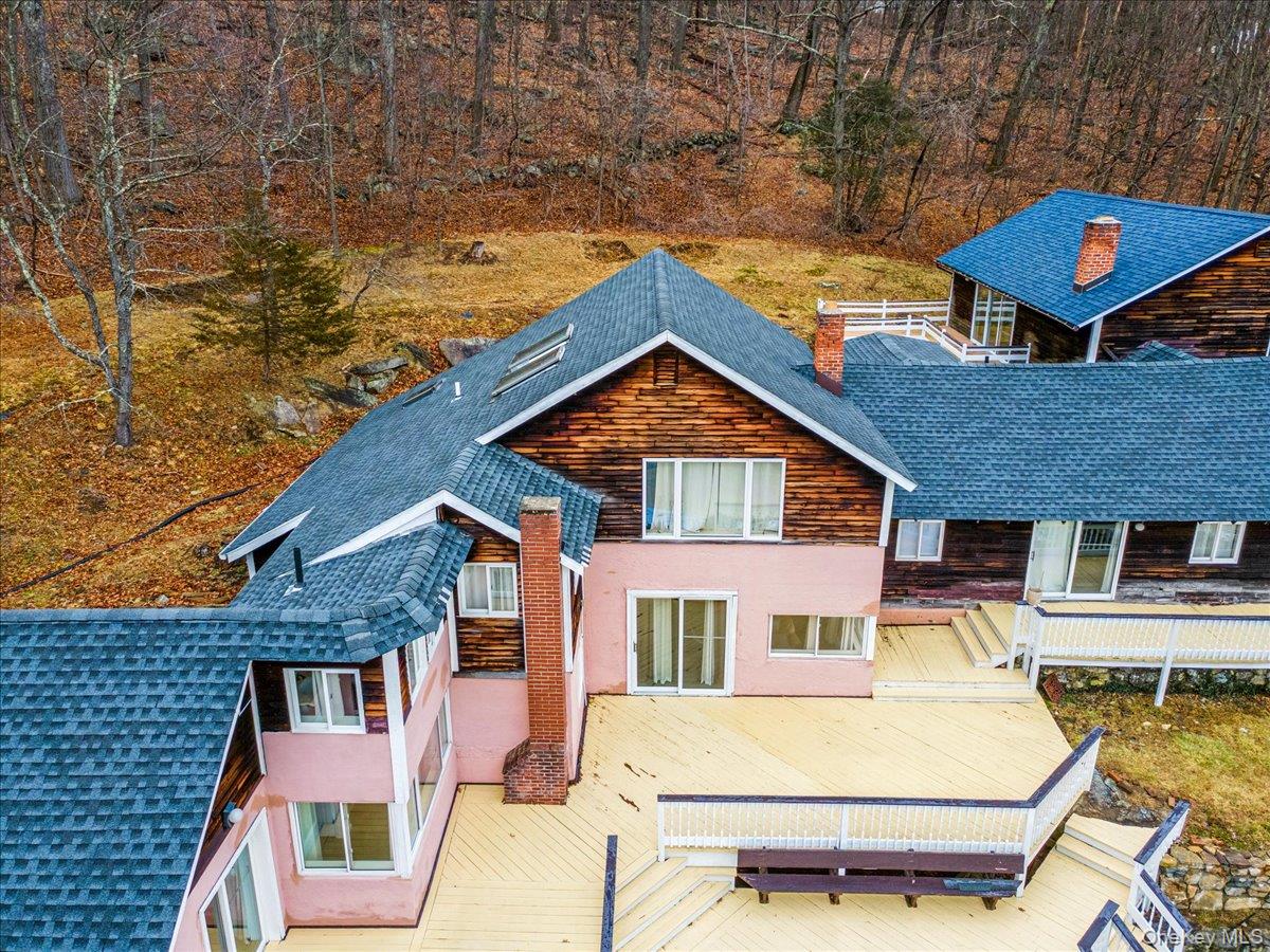 584 Milltown Road Brewster, NY 10509 - Photo 36 of 37 a front view of a house with a yard