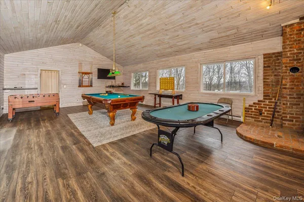 a living room with furniture and a table