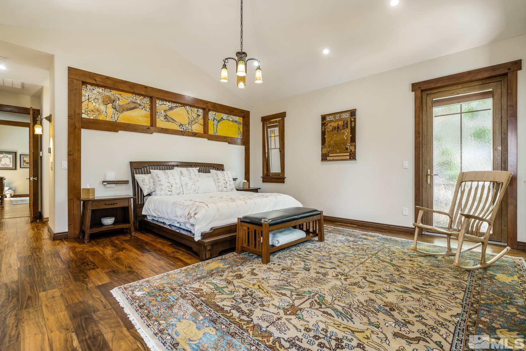 2785 West Lakeridge Reno, NV 89519 - Photo 17 of 40 a bedroom with a bed and wooden floor