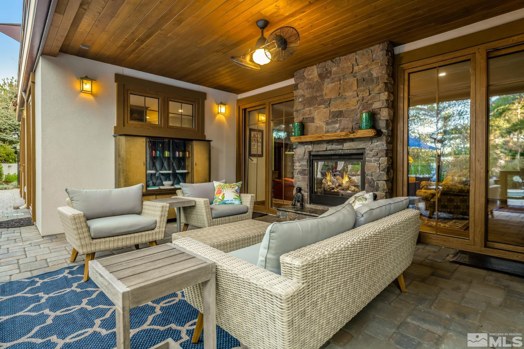 2785 West Lakeridge Reno, NV 89519 - Photo 29 of 40 a living room with furniture and a fireplace