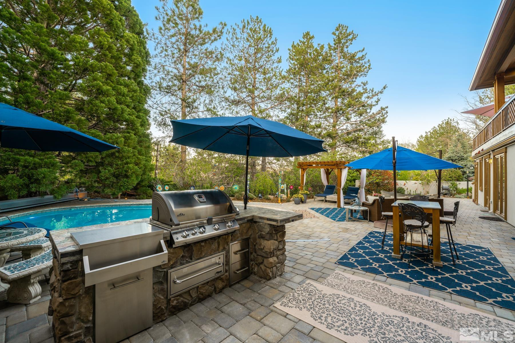 2785 West Lakeridge Reno, NV 89519 - Photo 33 of 40 a view of a backyard with sitting area and furniture