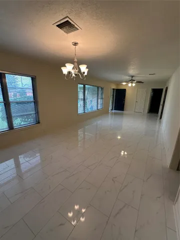 a view of a livingroom with a chandelier