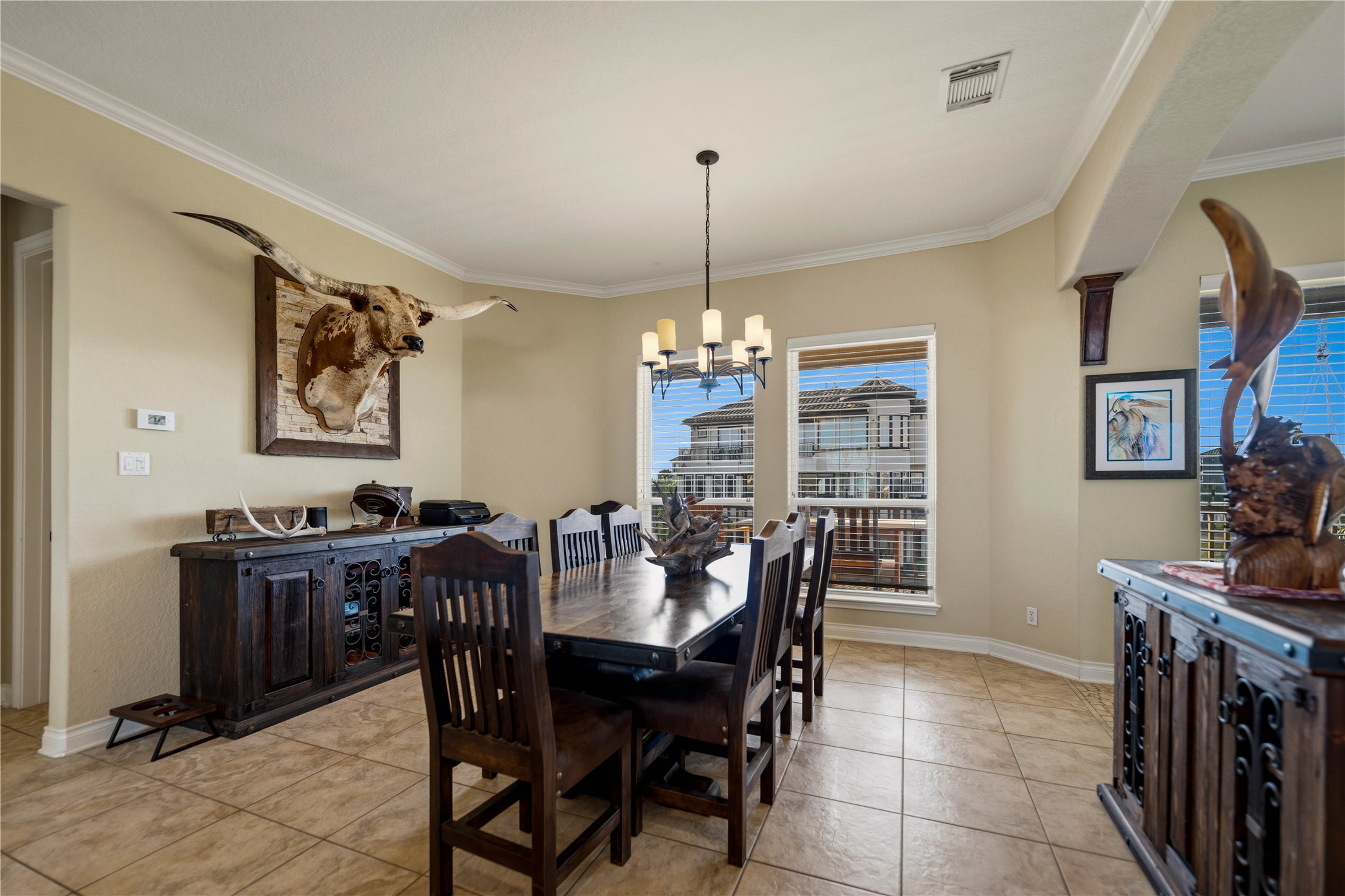 8 Loggerhead Hitchcock, TX 77563 - Photo 7 of 25 a view of a dining room with furniture and a chandelier