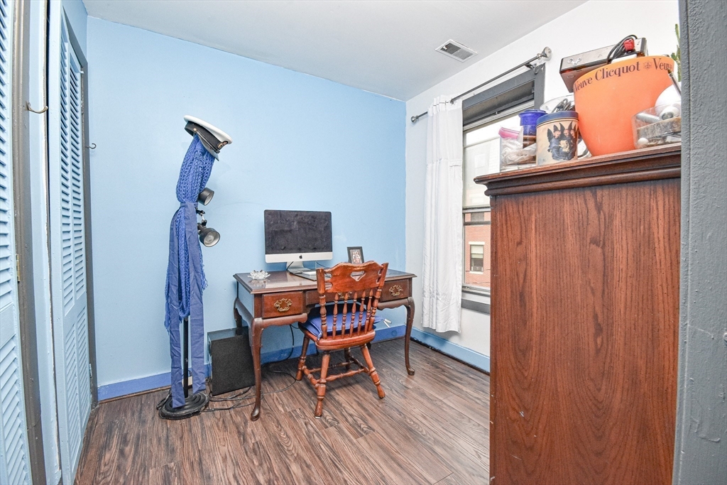 61 Webster Street, Unit 3 Boston, MA 02128 - Photo 19 of 20 a view of a dining room with furniture window and wooden floor
