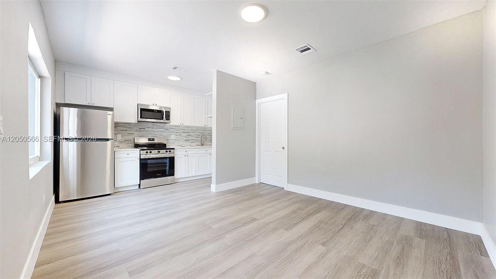 74 West 15th Street, Unit 4 Hialeah, FL 33010 - Photo 7 of 19 Living & Kitchen