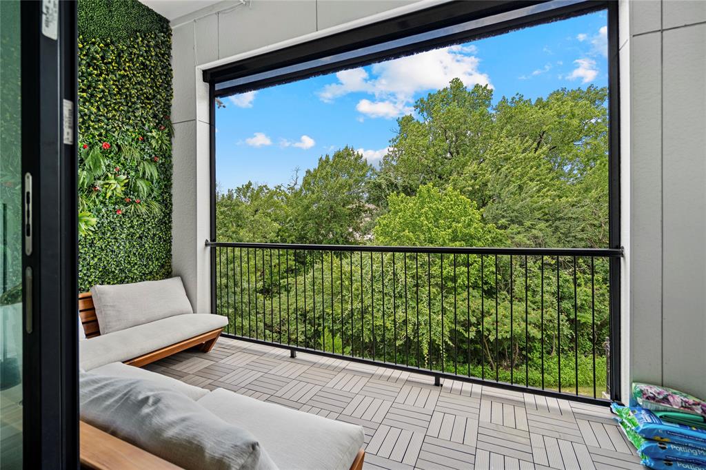 2157 Wenge Lane Dallas, TX 75219 - Photo 19 of 26 a view of a two chair in the balcony