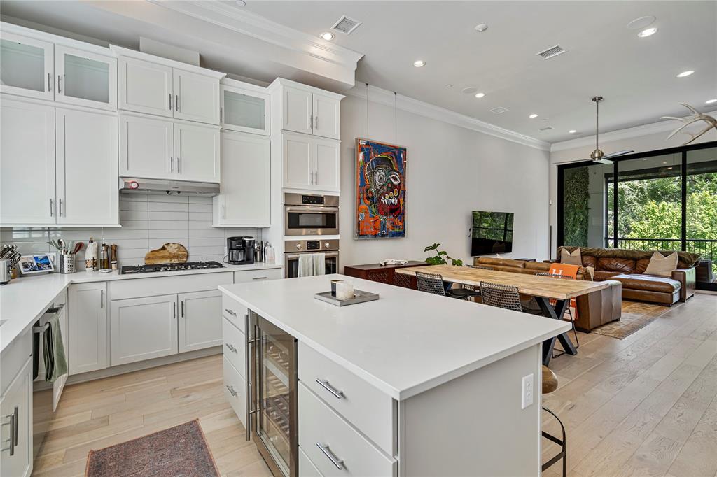 2157 Wenge Lane Dallas, TX 75219 - Photo 3 of 26 a kitchen with counter and sink