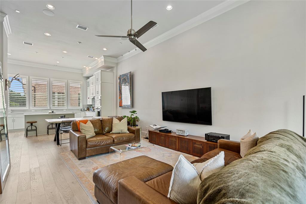 2157 Wenge Lane Dallas, TX 75219 - Photo 6 of 26 a living room with furniture and a flat screen tv