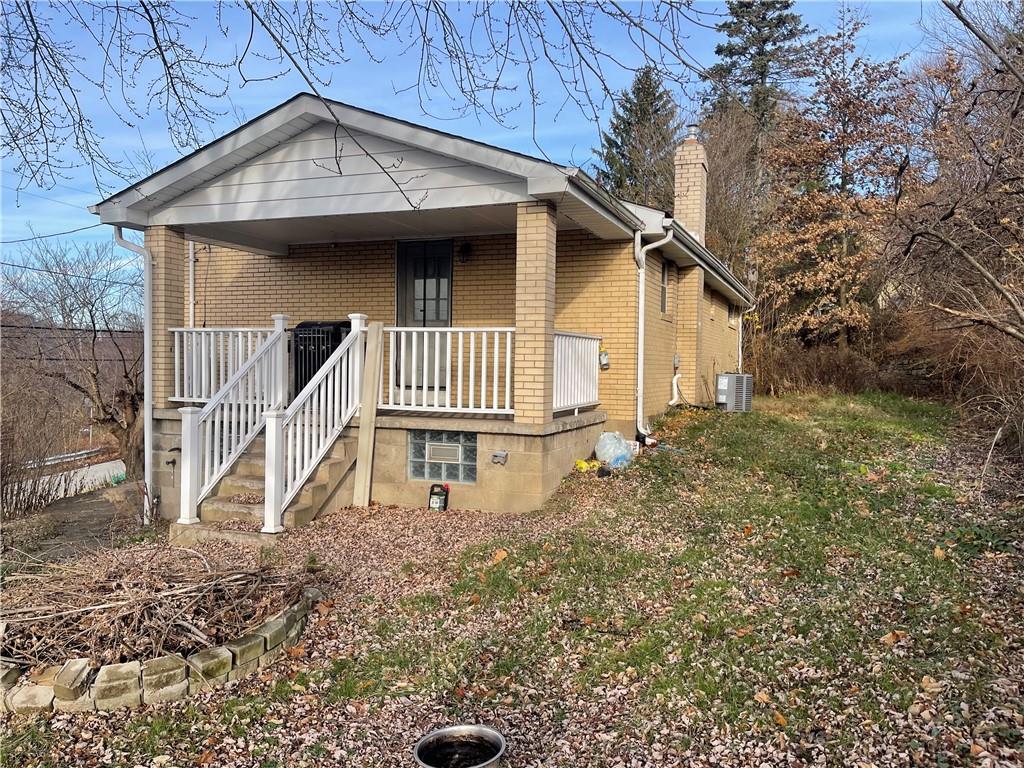 2720 Mt Troy Road Pittsburgh, PA 15212 - Photo 2 of 15 a front view of a house with a yard