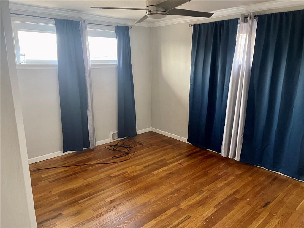 2720 Mt Troy Road Pittsburgh, PA 15212 - Photo 3 of 15 a bedroom with a bed and a window