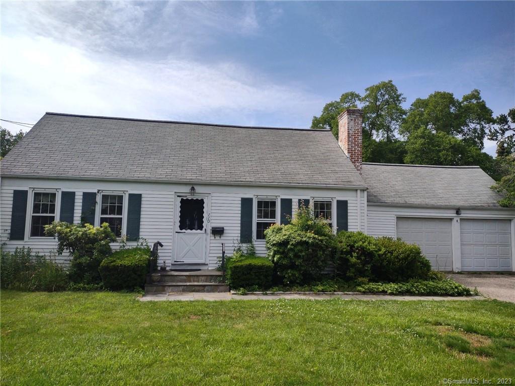 110 Judson Road Fairfield, CT 06824 - Photo 1 of 1 a front view of house with a garden