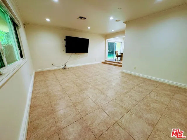 a view of a livingroom with a flat screen tv