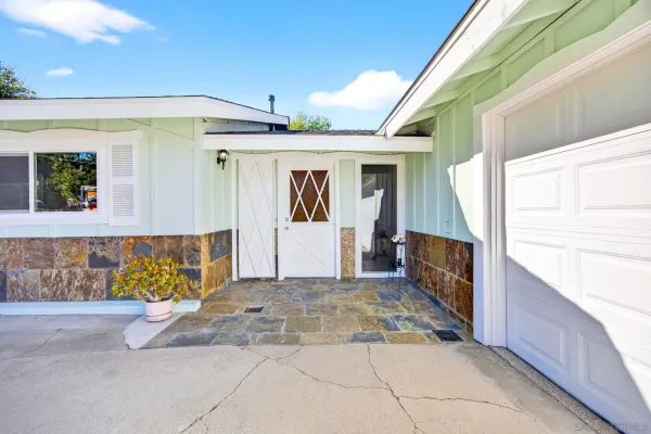 a view of a back door of the house