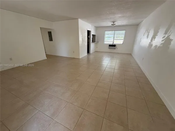 a view of a livingroom with a window