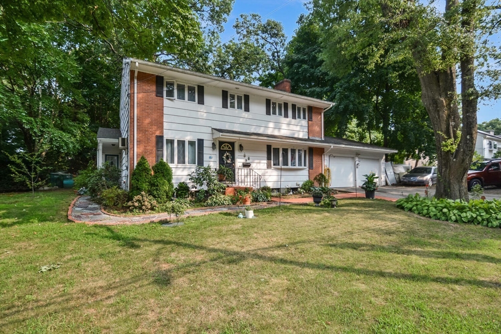 9 Flagg Drive Framingham, MA 01702 - Photo 16 of 22 a view of a house with swimming pool and sitting area