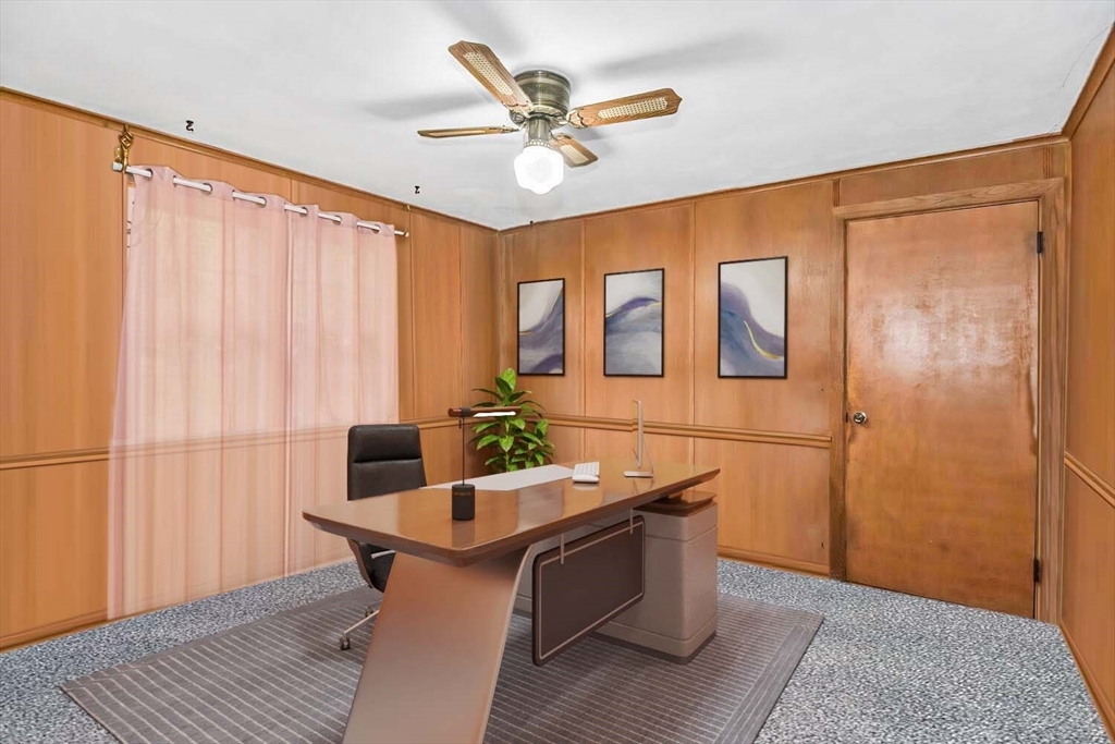 9 Flagg Drive Framingham, MA 01702 - Photo 9 of 22 a work room with furniture and a ceiling fan