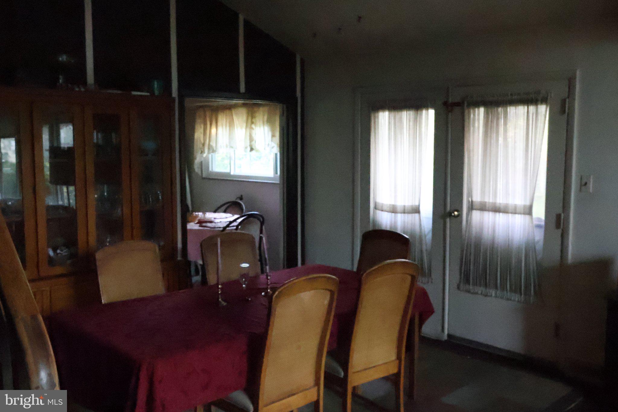 1456 Thornberry Road Wyncote, PA 19095 - Photo 15 of 25 Inviting dining space with natural light.