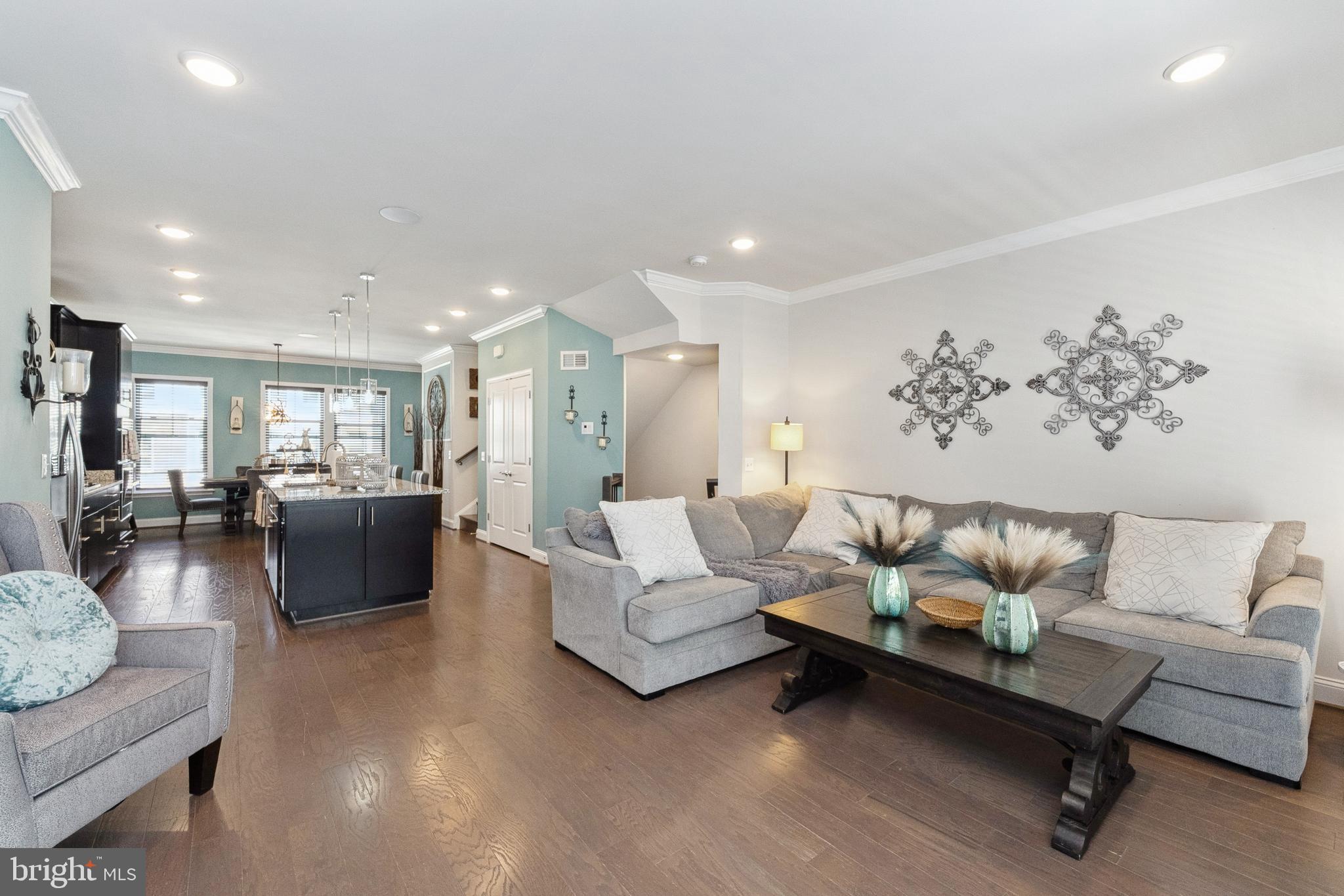 1925 Greenbriar Hall Road Dumfries, VA 22026 - Photo 12 of 63 a living room with furniture and a wooden floor