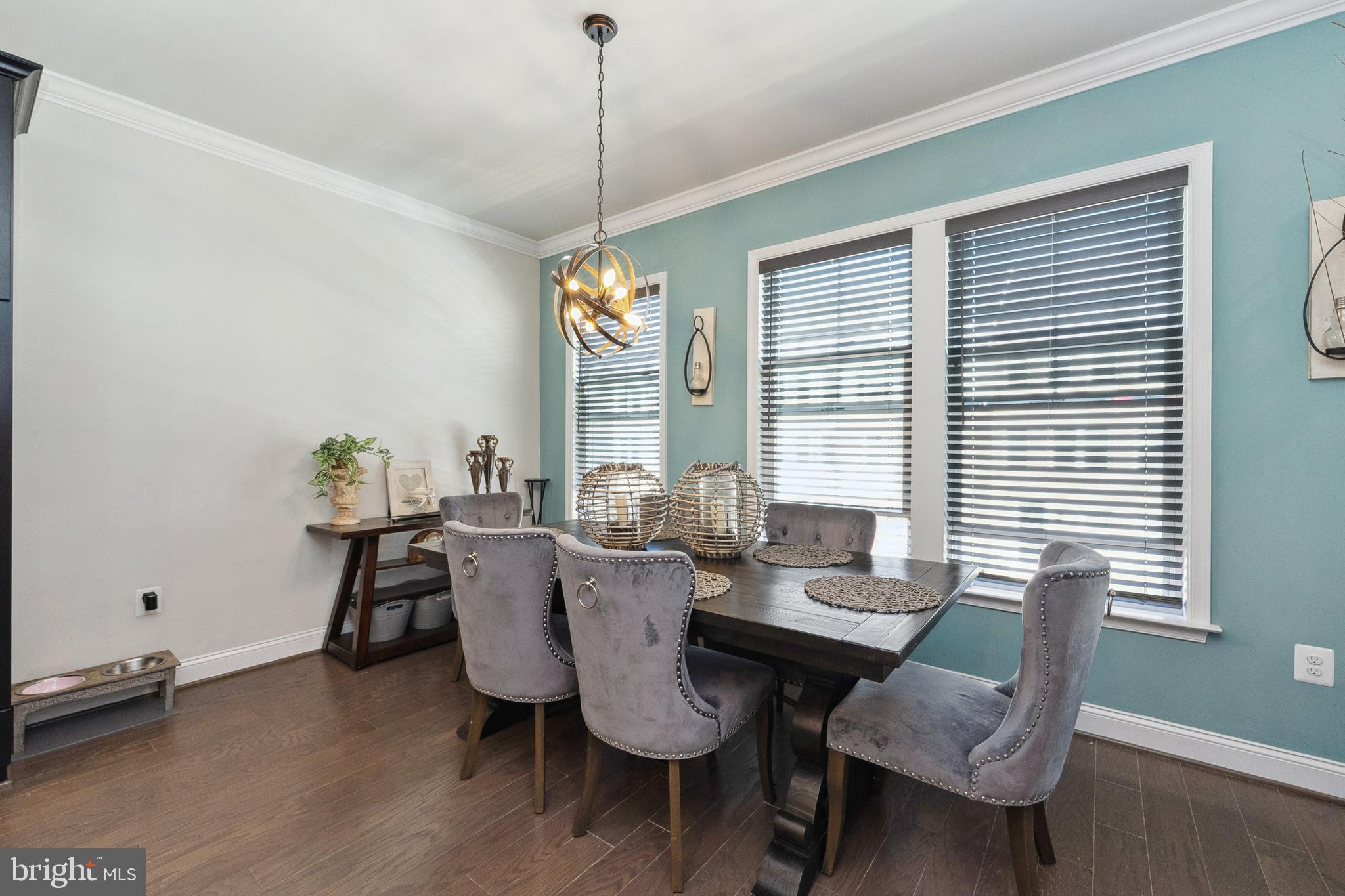 1925 Greenbriar Hall Road Dumfries, VA 22026 - Photo 16 of 63 a view of a dining room with furniture window and wooden floor