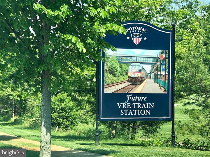 1925 Greenbriar Hall Road Dumfries, VA 22026 - Photo 55 of 63 a sign on the side of the tree