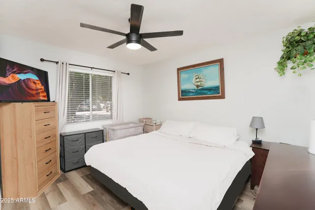 a room with a bed and a window