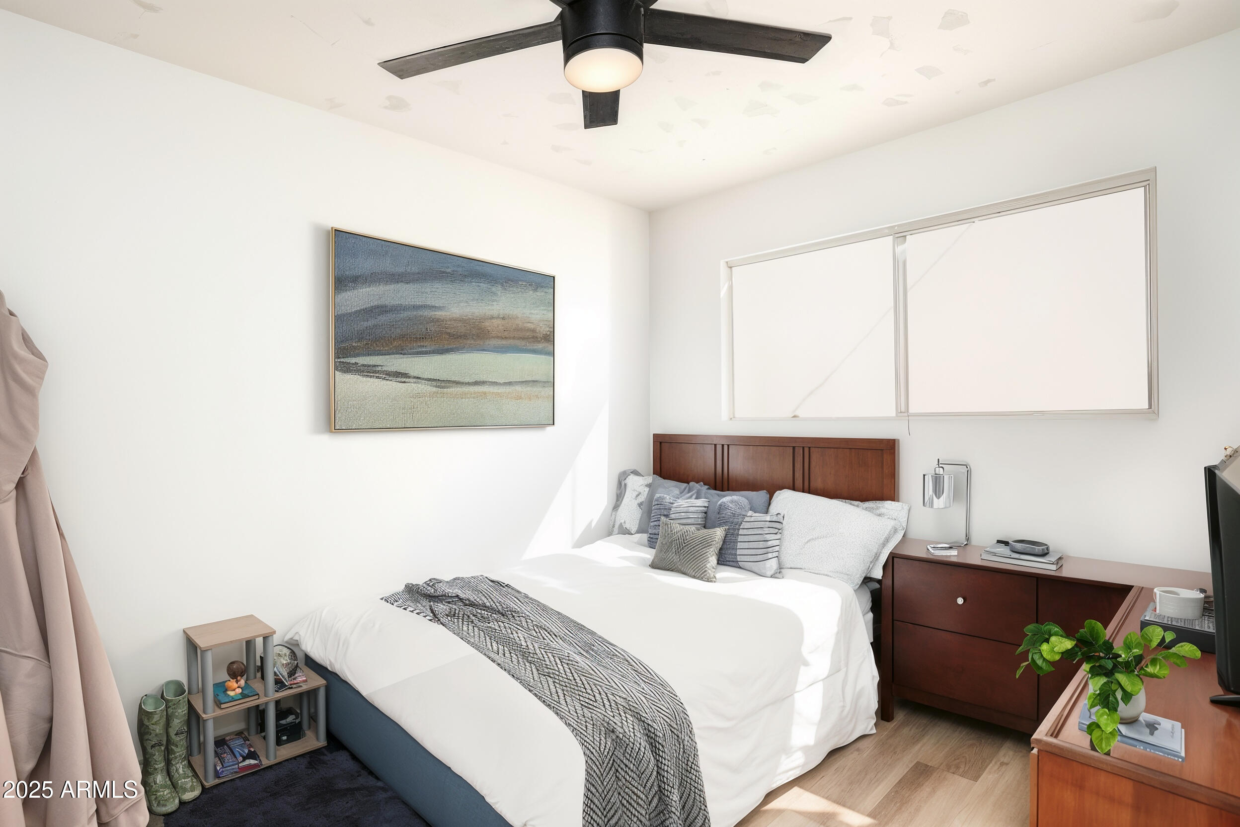 605 3rd N Street Clarkdale, AZ 86324 - Photo 18 of 37 a bedroom with a bed dresser and a window