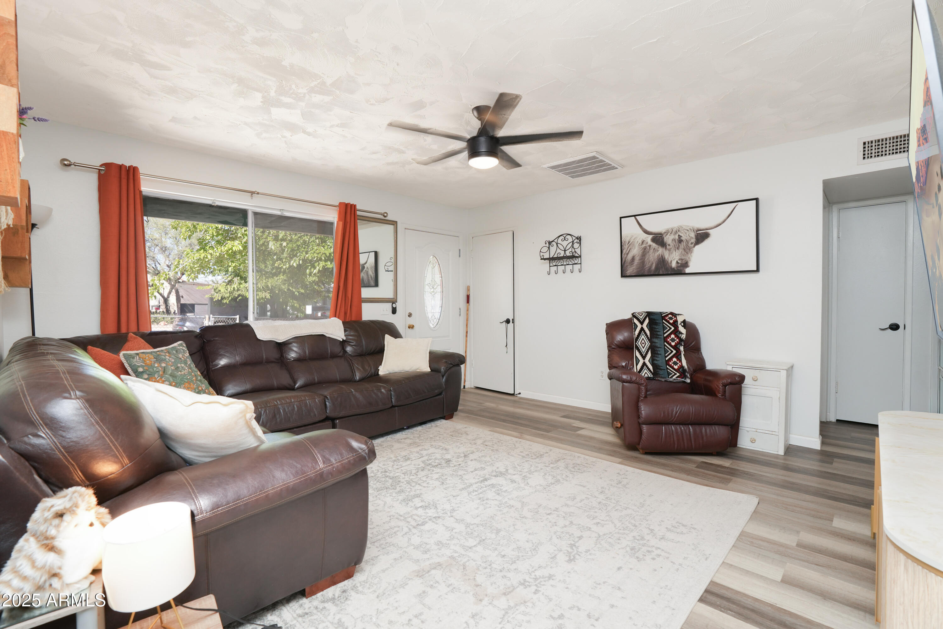 605 3rd N Street Clarkdale, AZ 86324 - Photo 7 of 37 a living room with furniture and a large window
