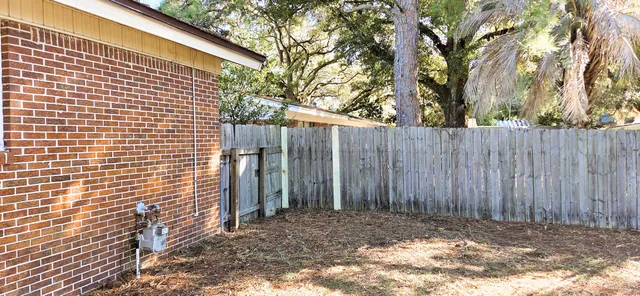 a view of a backyard with a slide