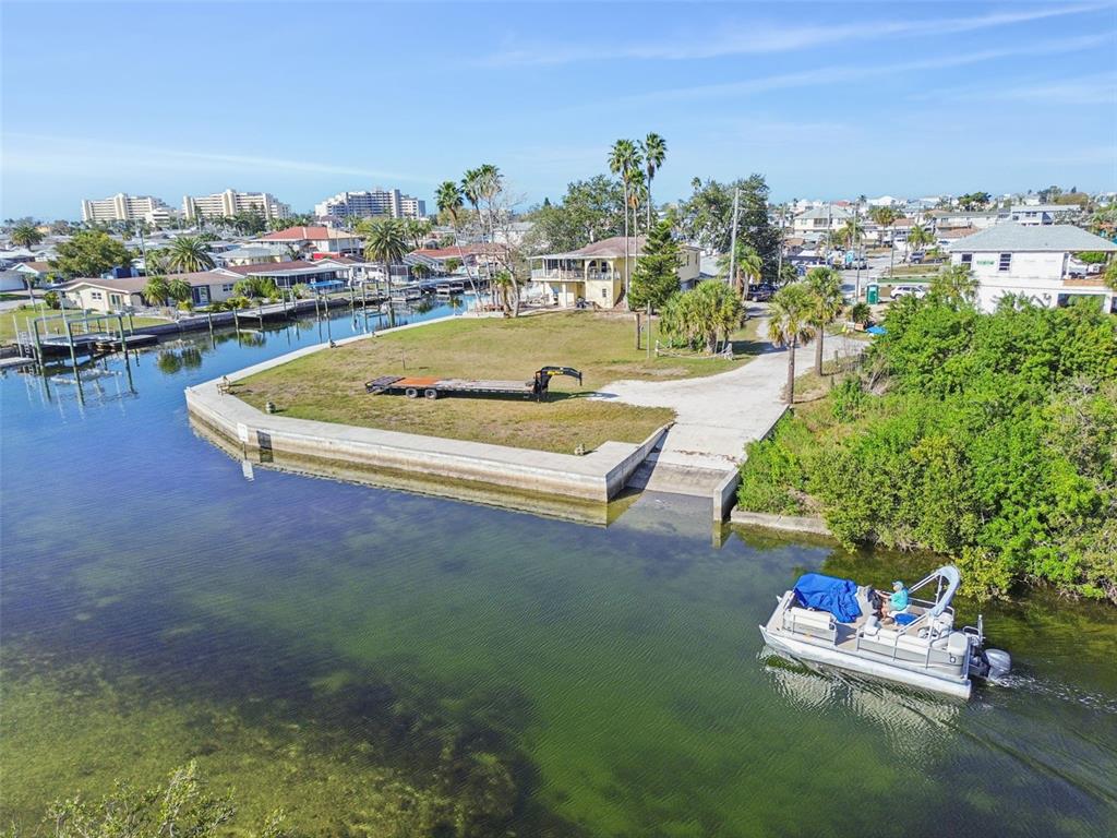 6374 Boatyard Drive Hudson, FL 34667 - Photo 23 of 25 a view of a swimming pool and lounge chair