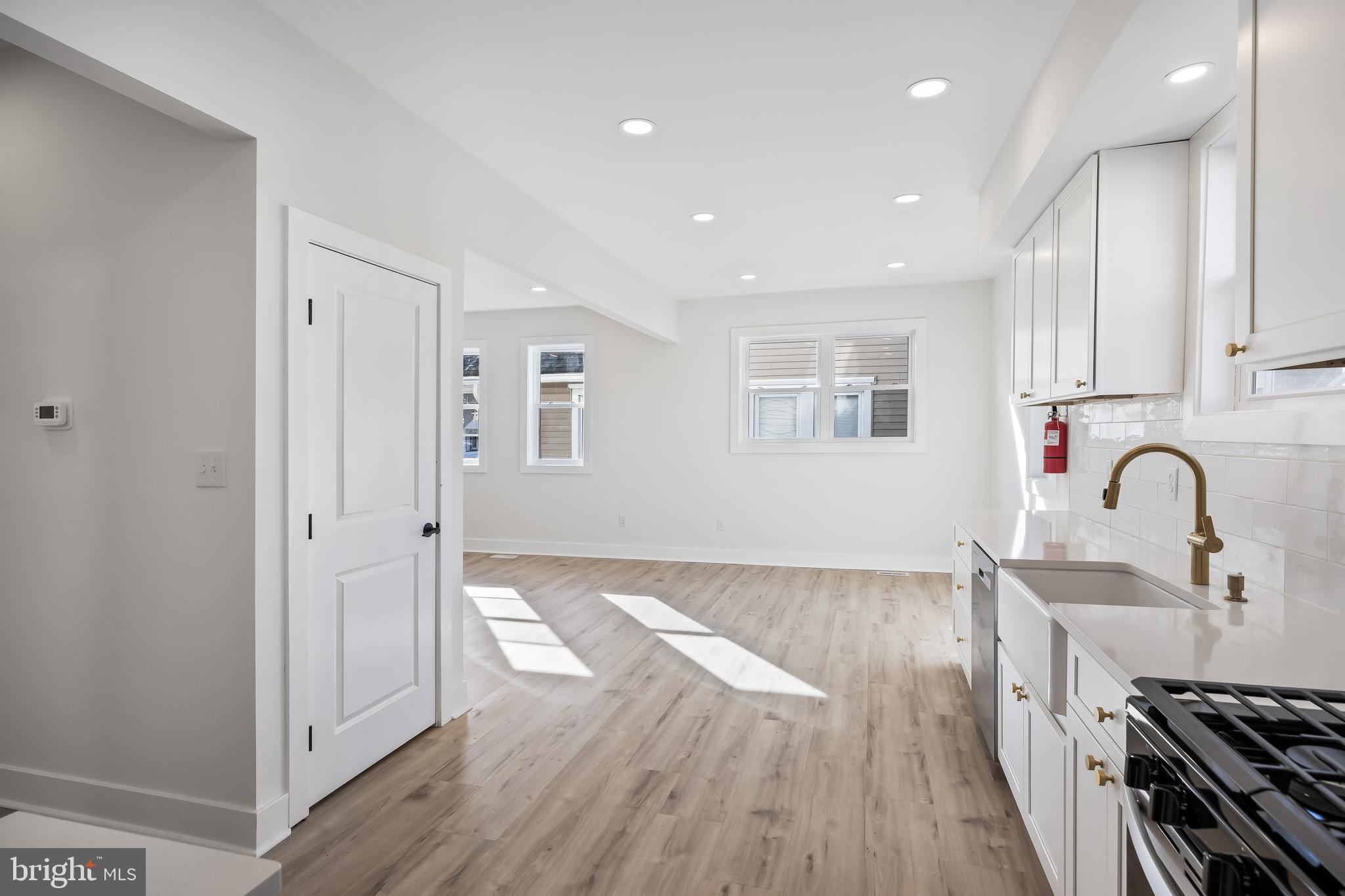 133 Lafayette Road Audubon, NJ 08106 - Photo 11 of 23 a view of kitchen with wooden floor and electronic appliances