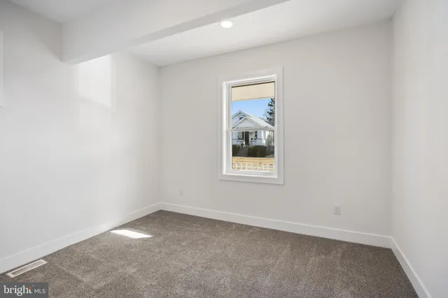 an empty room with a window