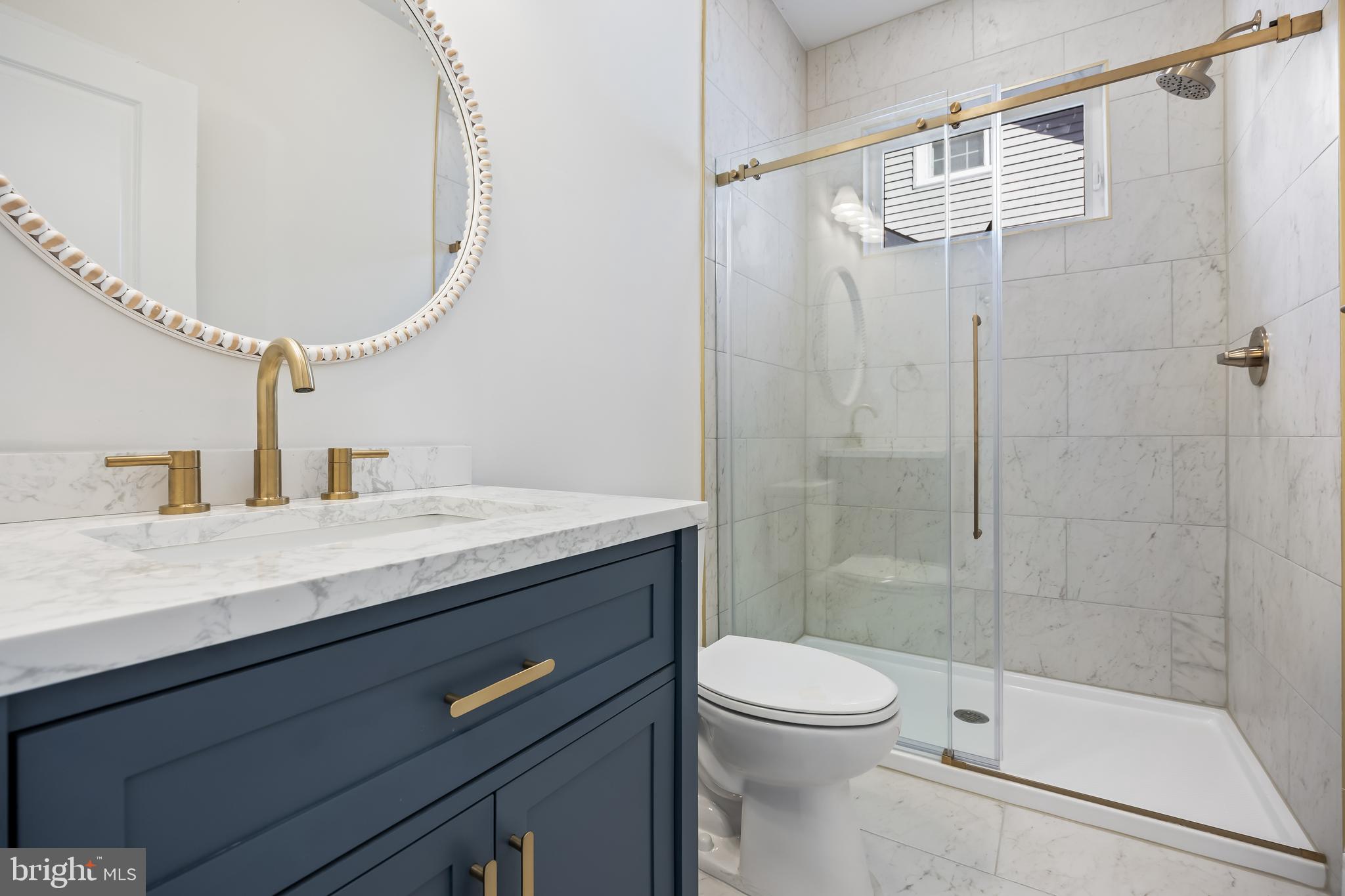 133 Lafayette Road Audubon, NJ 08106 - Photo 13 of 23 a bathroom with a granite countertop sink a toilet and shower