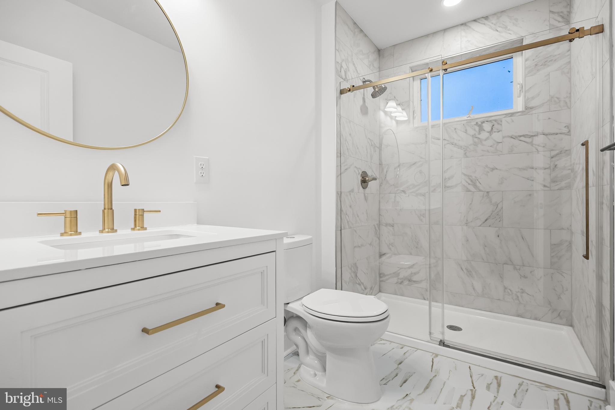 133 Lafayette Road Audubon, NJ 08106 - Photo 18 of 23 a bathroom with a sink a toilet and shower
