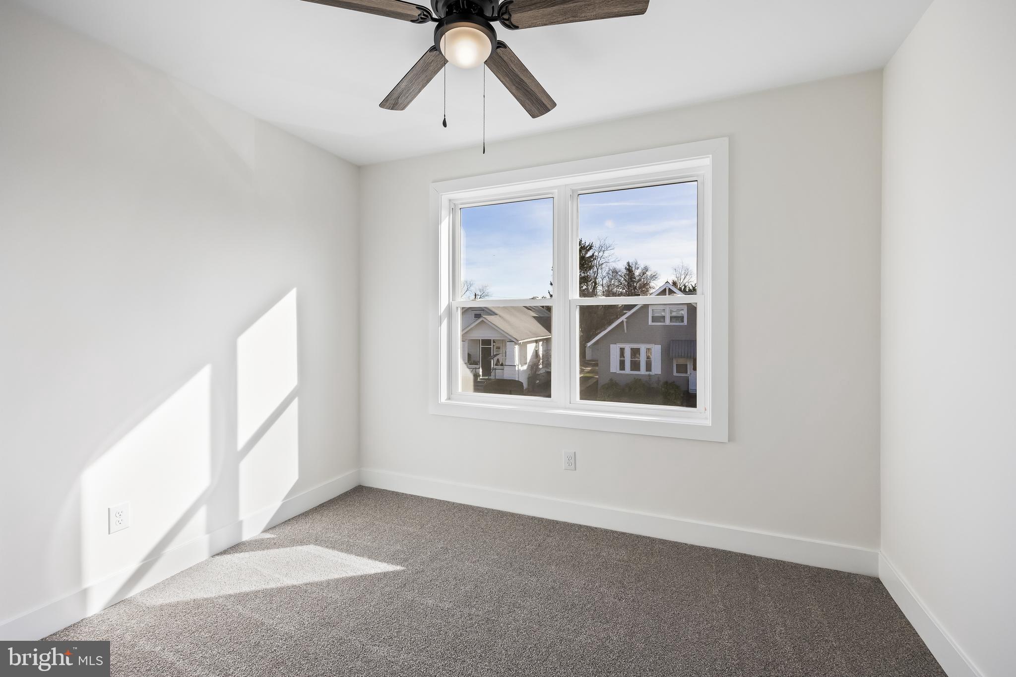 133 Lafayette Road Audubon, NJ 08106 - Photo 21 of 23 an empty room with windows and fan