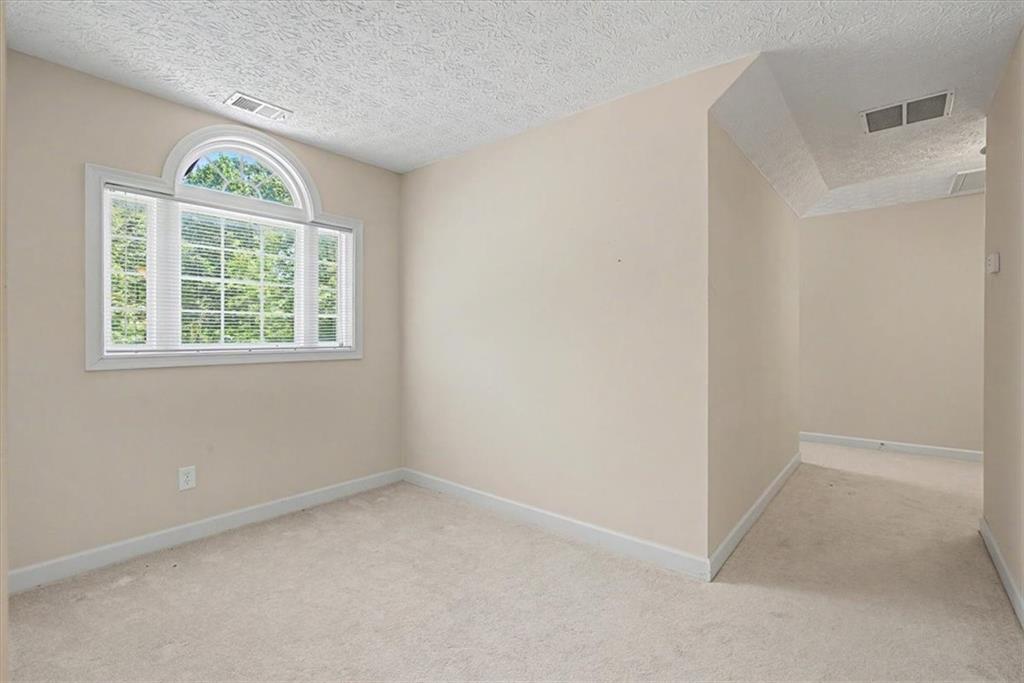 1136 Cole Lake Road Dallas, GA 30157 - Photo 42 of 72 an empty room with a window