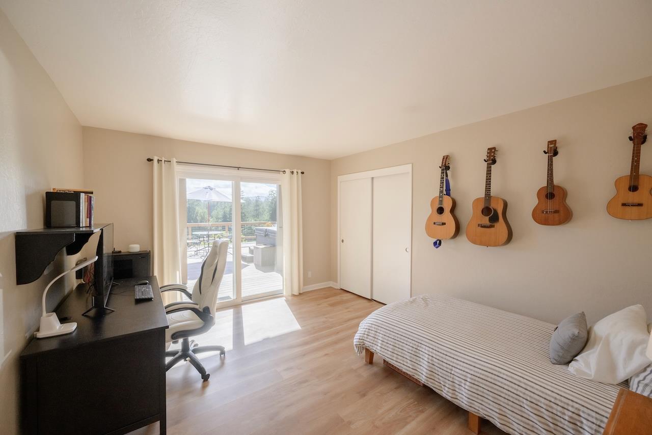 155 Rabbits Run Road Santa Cruz, CA 95060 - Photo 79 of 113 a bedroom with furniture and a window