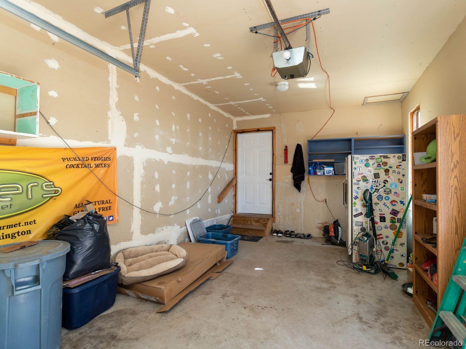 6115 Sengbeil Road Yoder, CO 80864 - Photo 24 of 43 a view of a room with gym equipment