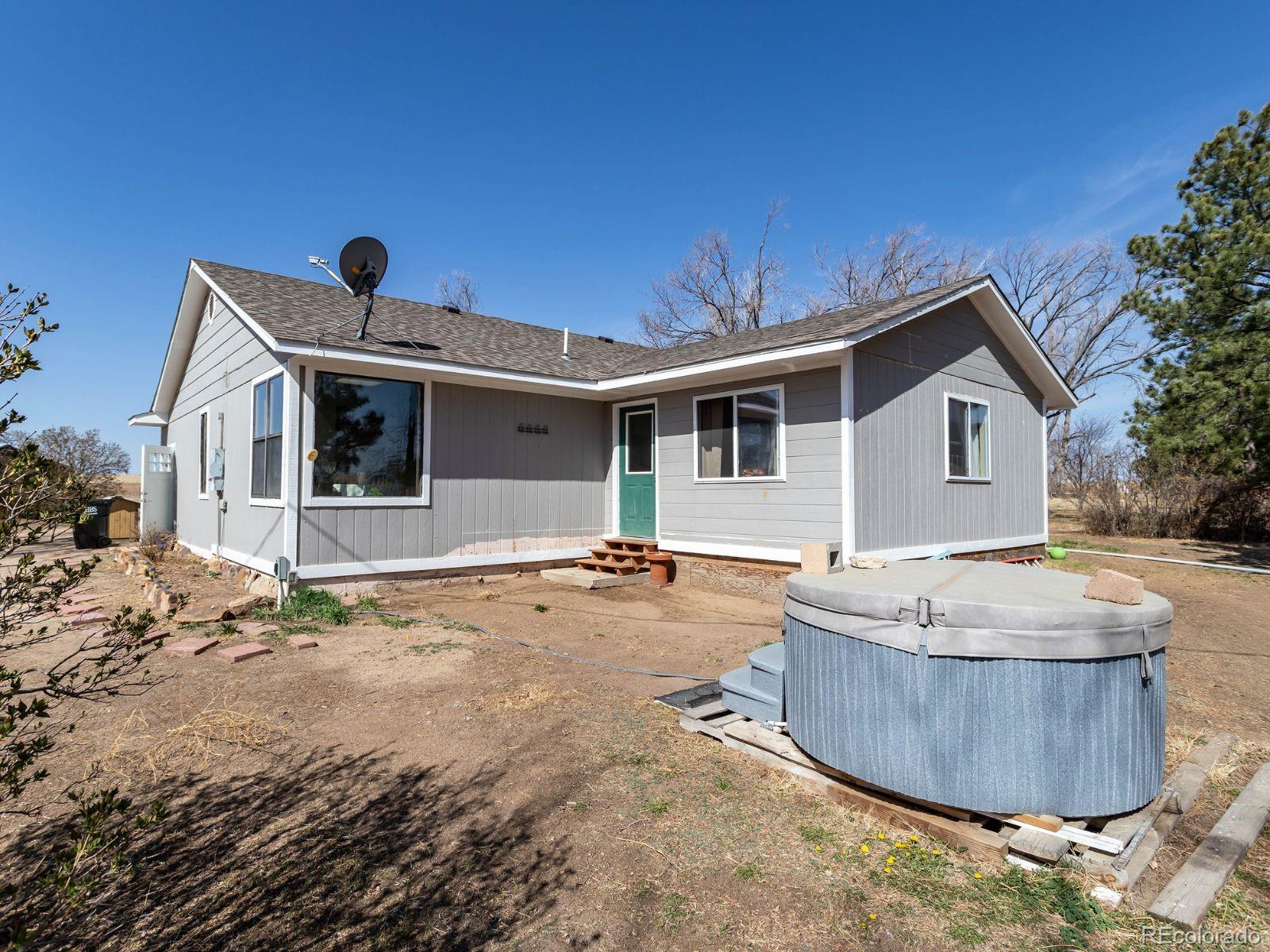 6115 Sengbeil Road Yoder, CO 80864 - Photo 26 of 43 a front view of a house with porch