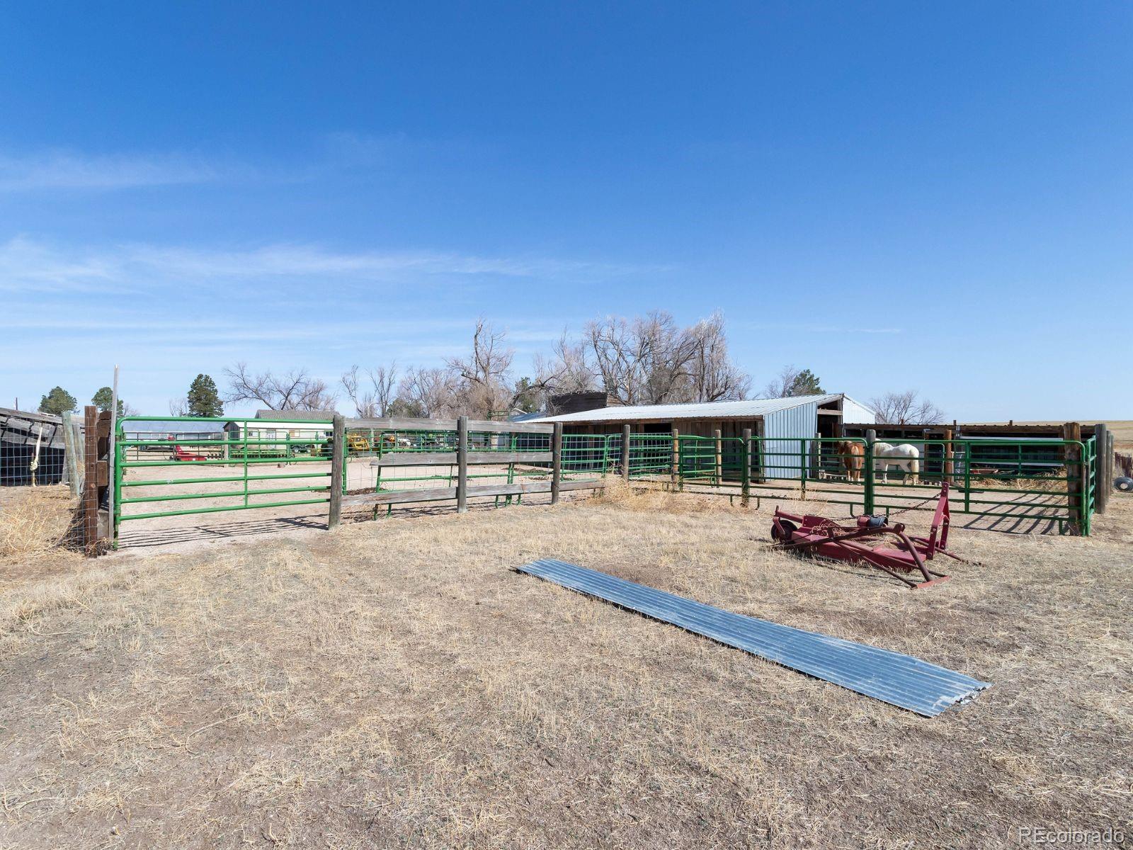 6115 Sengbeil Road Yoder, CO 80864 - Photo 36 of 43 a view of a backyard of a house