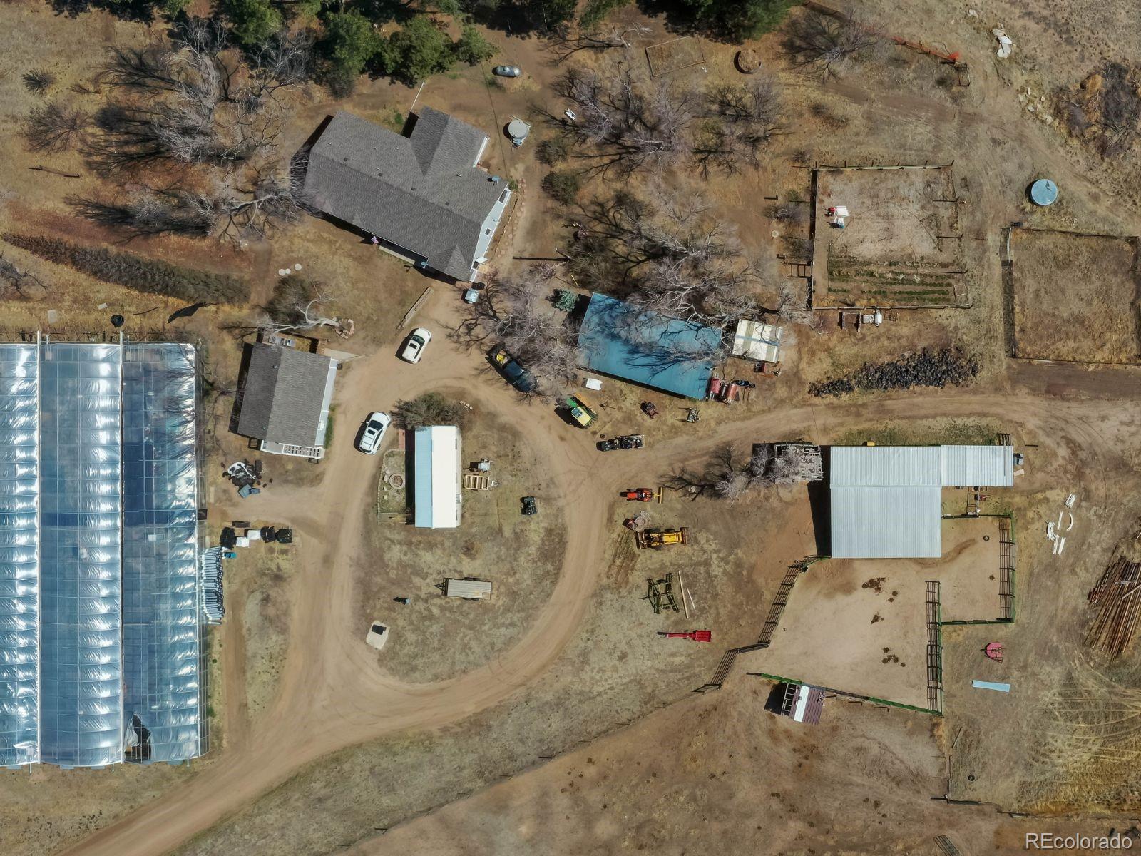 6115 Sengbeil Road Yoder, CO 80864 - Photo 43 of 43 an aerial view of residential houses with outdoor space