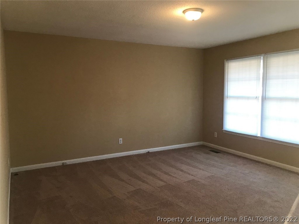 4510 Ruby Road Fayetteville, NC 28311 - Photo 3 of 22 an empty room with a window