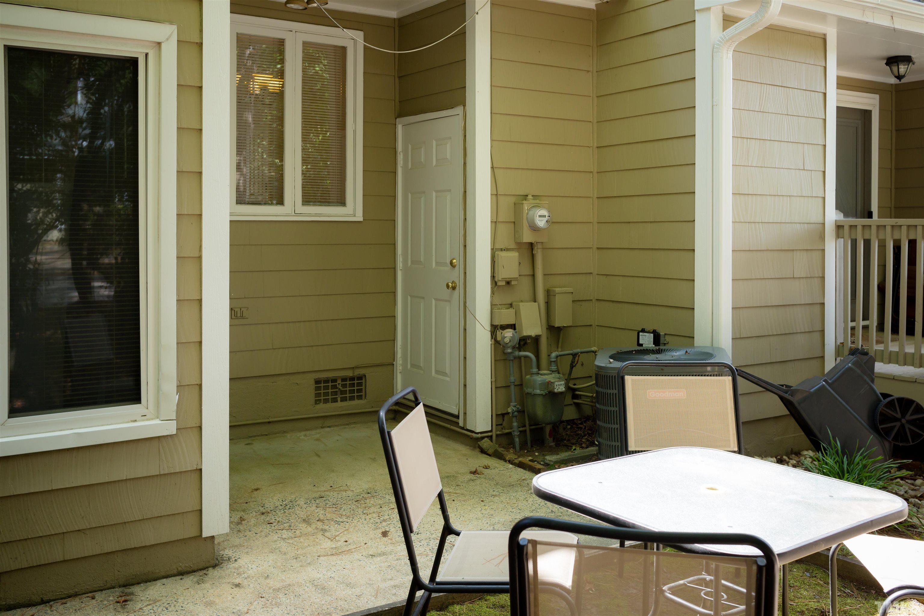 4326 Beechnut Lane Durham, NC 27707 - Photo 25 of 26 a backyard of a house with table and chairs