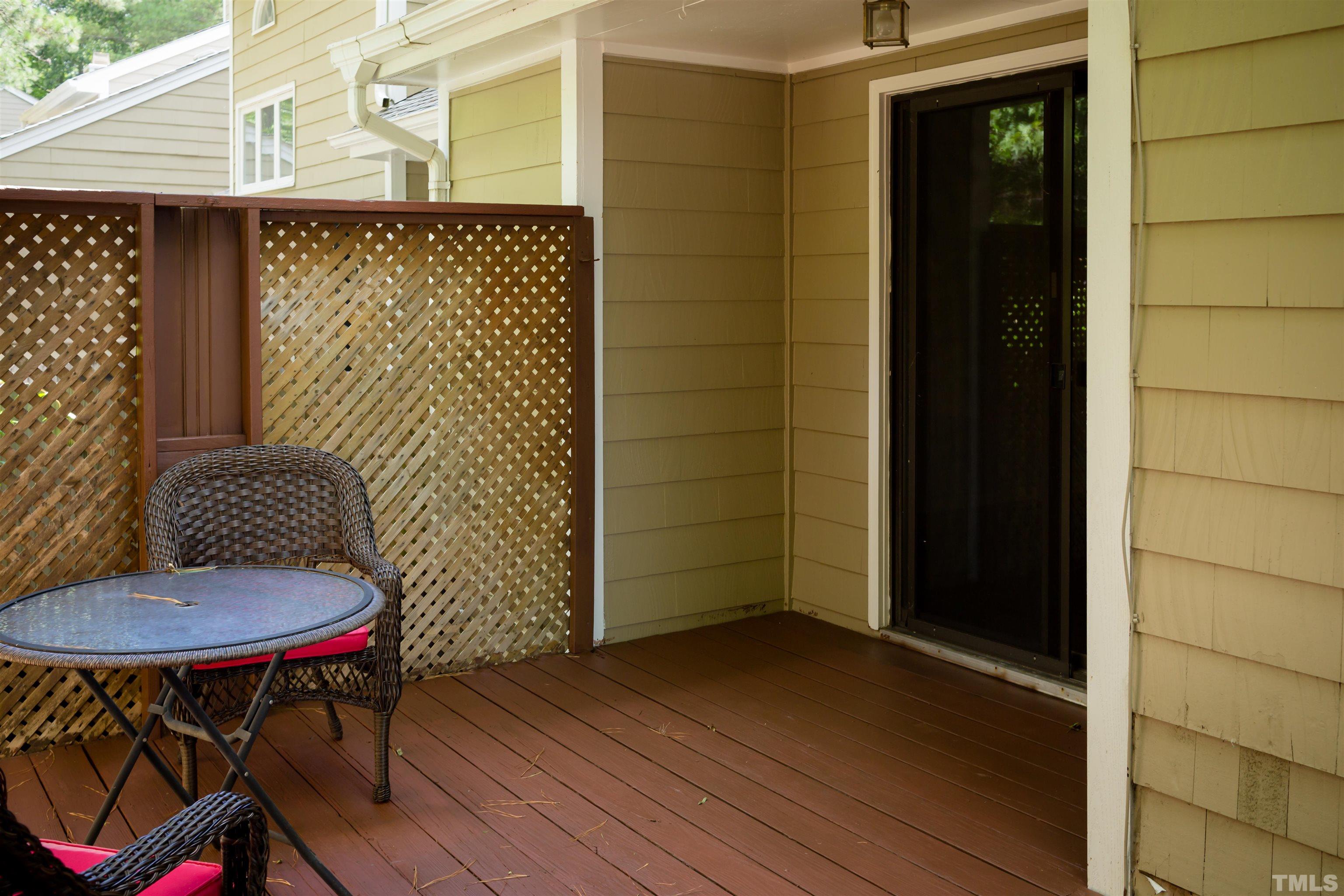 4326 Beechnut Lane Durham, NC 27707 - Photo 26 of 26 a balcony with table and chairs