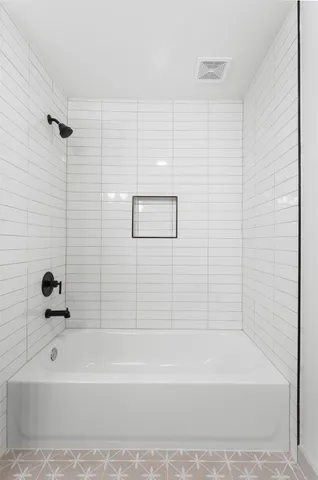a bathroom with a bathtub