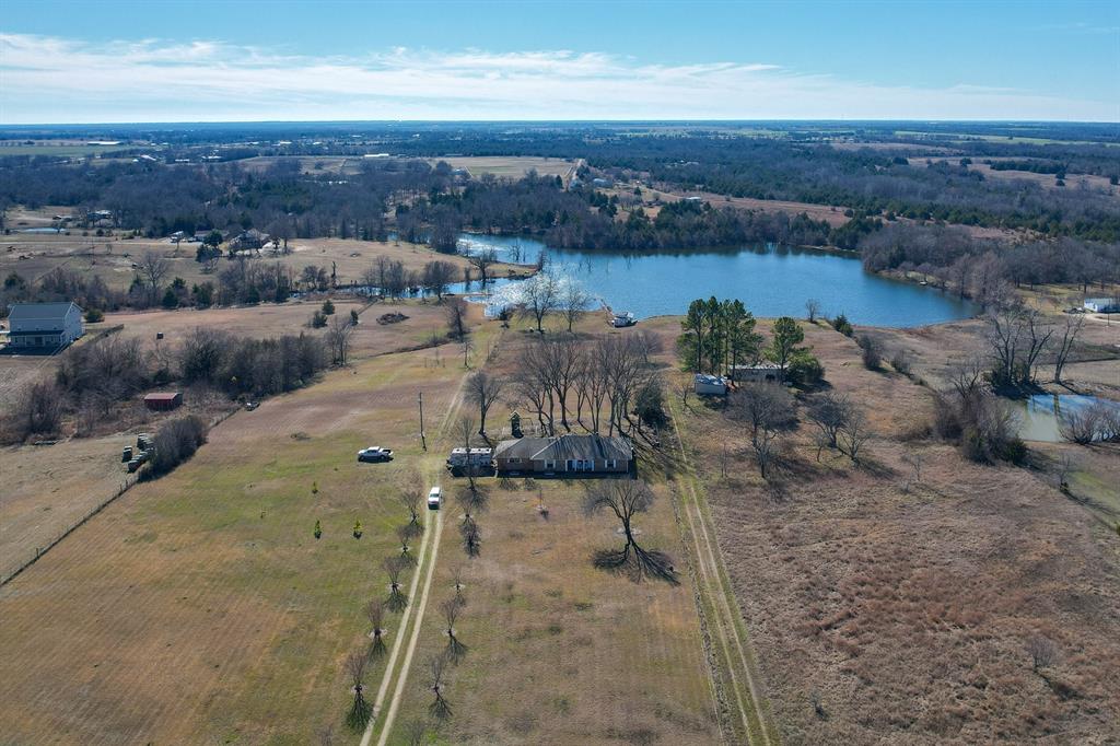 477 Fm 1553 Bonham, TX 75418 - Photo 2 of 10 a view of a lake