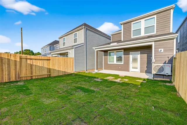 a view of yard with swimming pool outdoor seating and deck