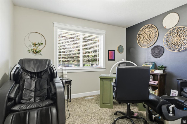772 East 600 South Preston, ID 83263 - Photo 16 of 35 Carpeted room featuring a window with white blinds and trim, a contrasting dark accent wall, and recessed lighting