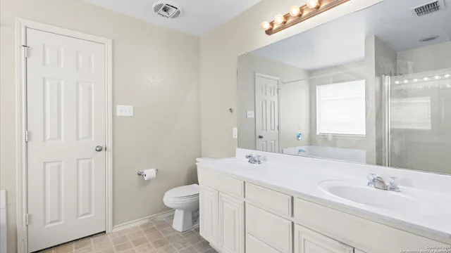 a white bath tub sitting next to a window